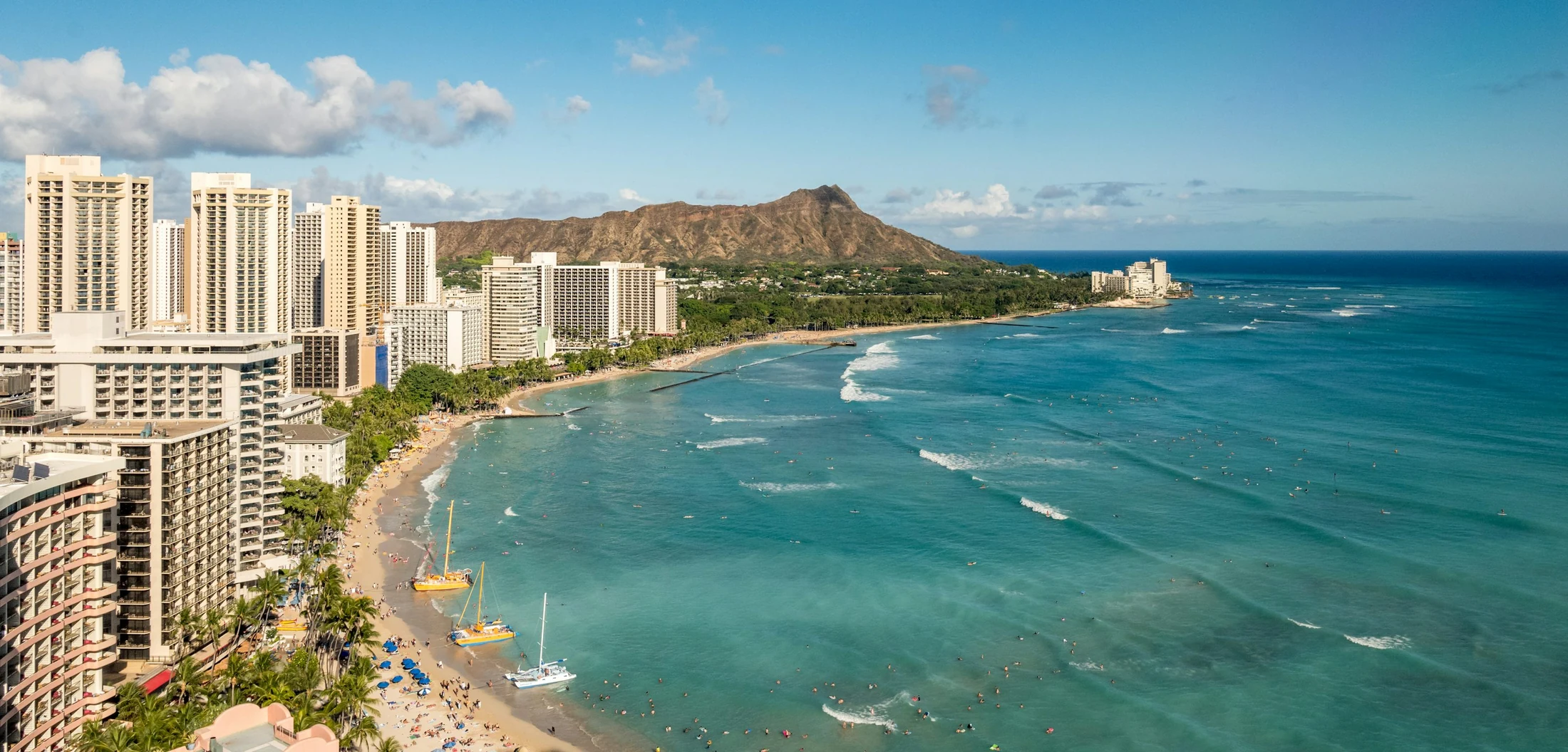 Aerial view of Honolulu skyline, Waikiki coastline, and the Pacific Ocean